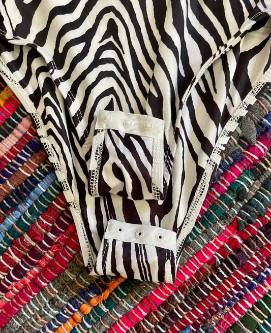 zebra print body suit (used) - Lil Shop of Light & Love