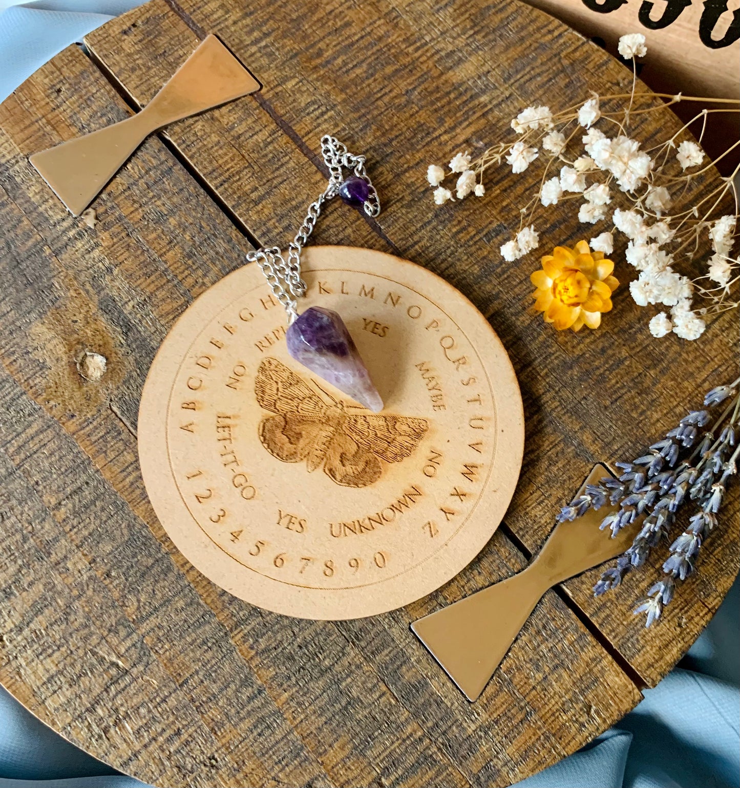wooden moth spirit board