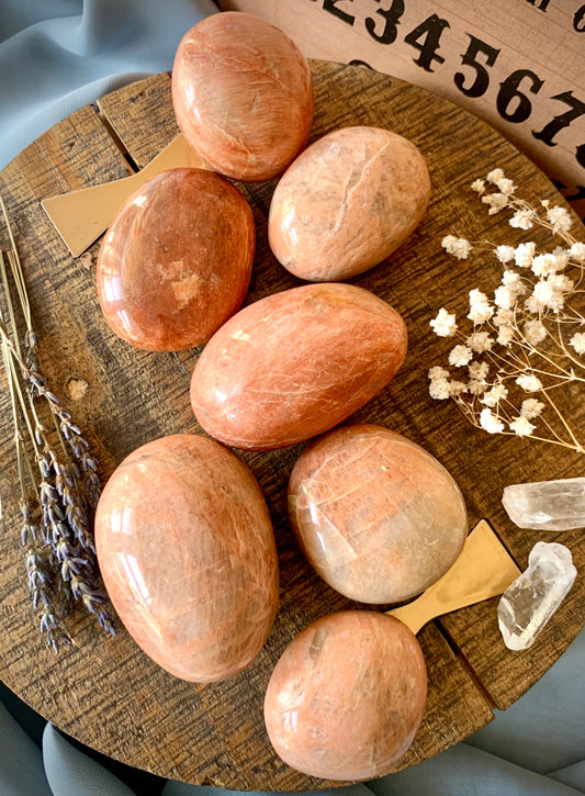 peach moonstone palm stones