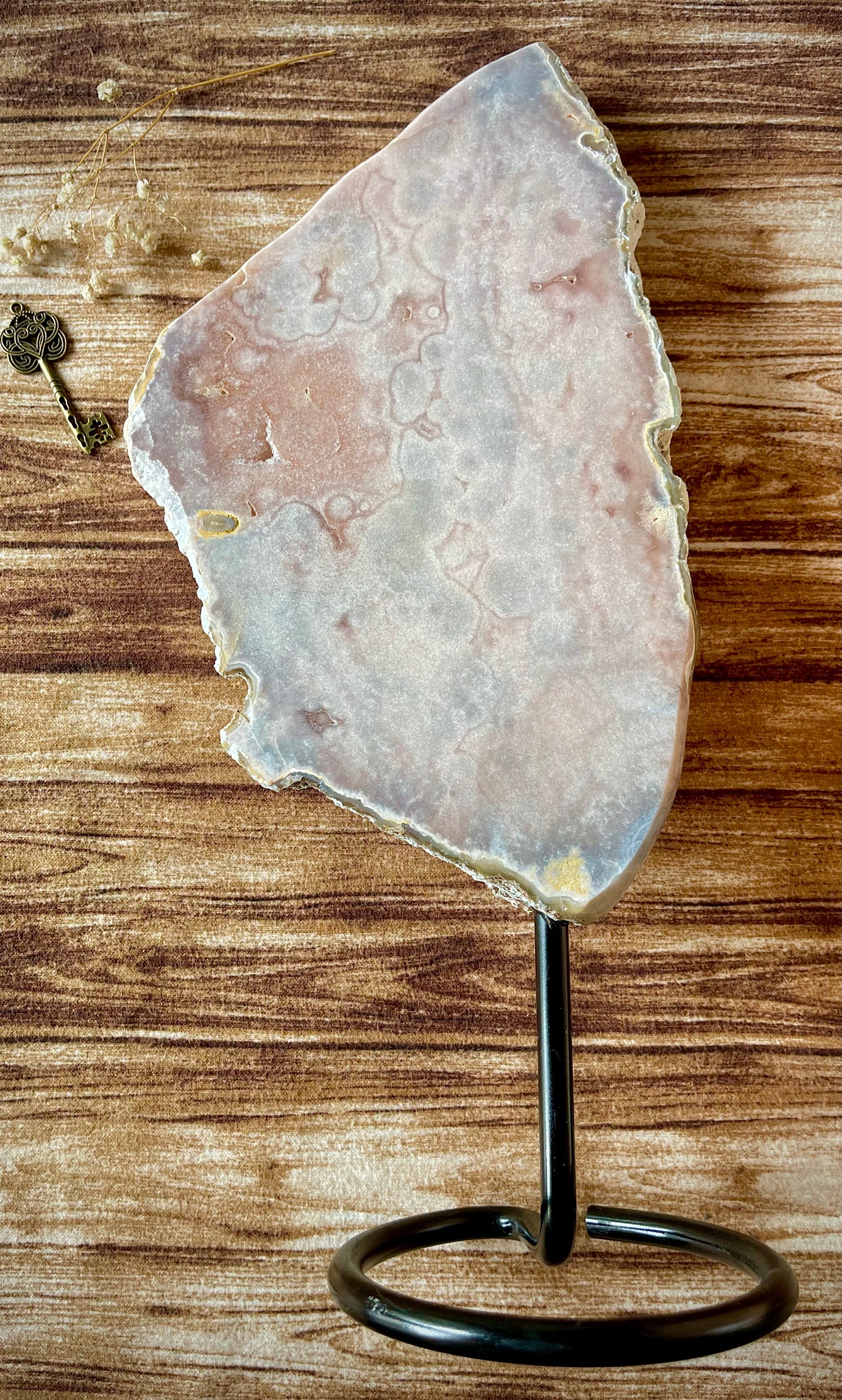 pink amethyst slab on a stand
