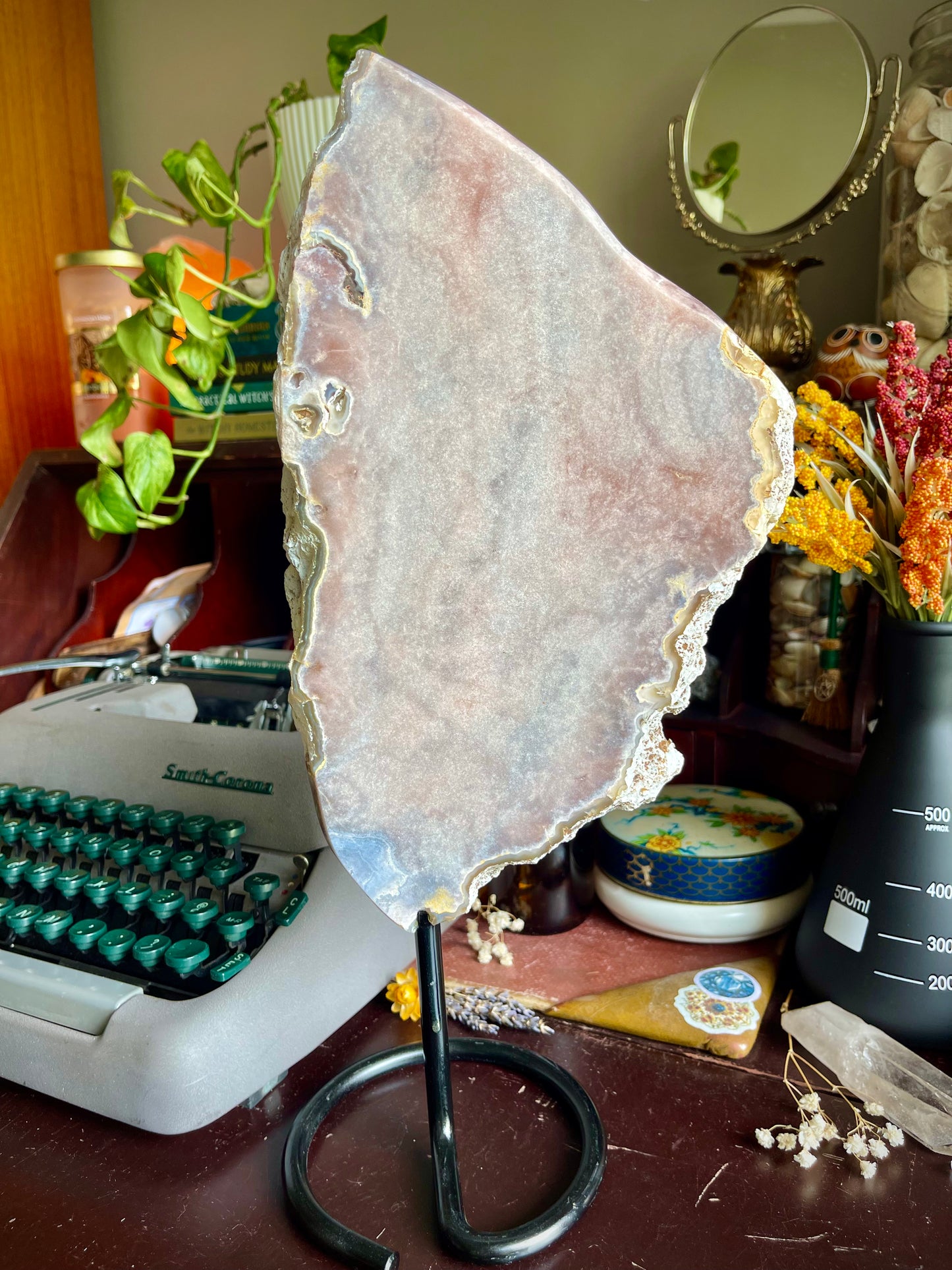 pink amethyst slab on a stand