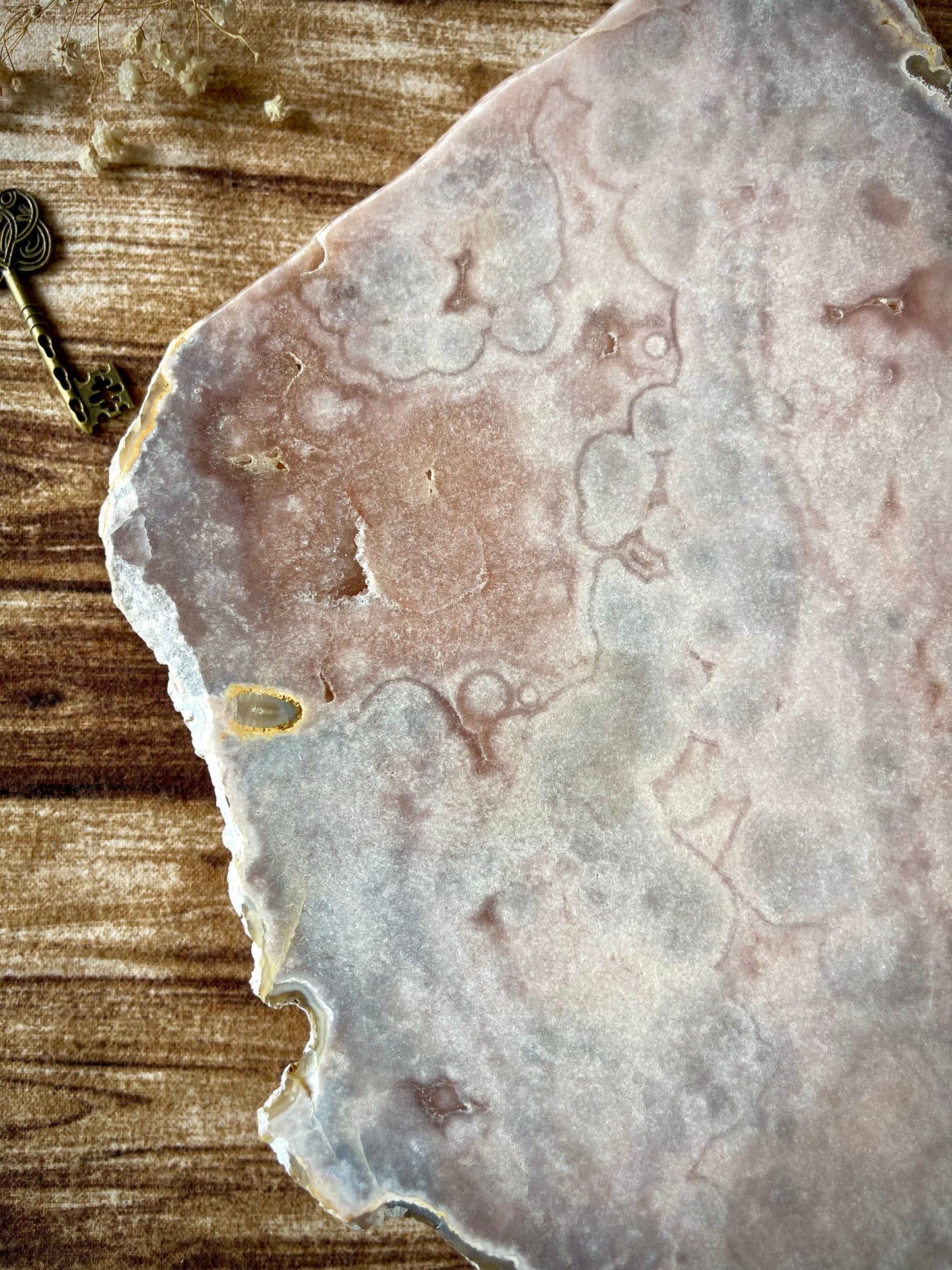 pink amethyst slab on a stand