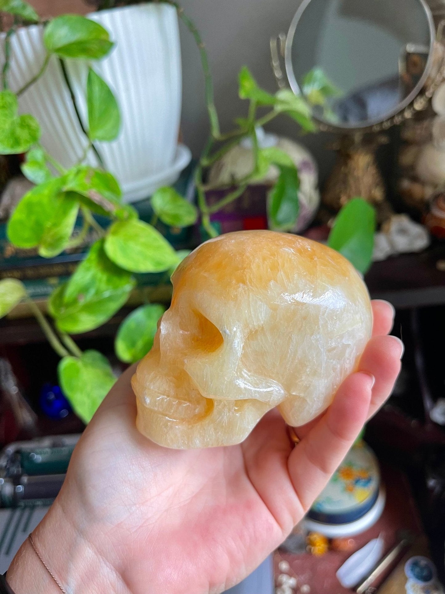 orange calcite skulls - lil shop of light & love