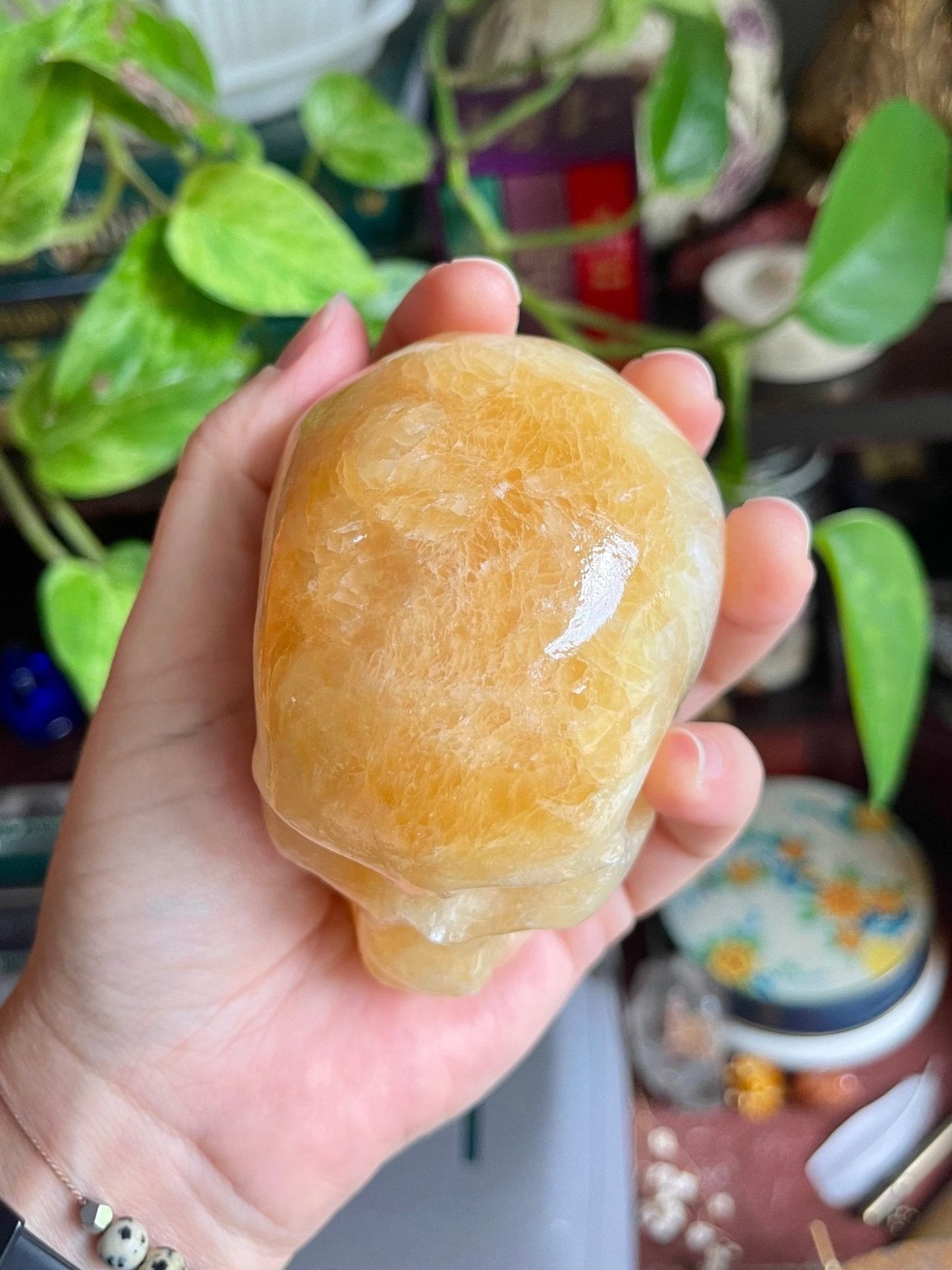 orange calcite skulls - lil shop of light & love