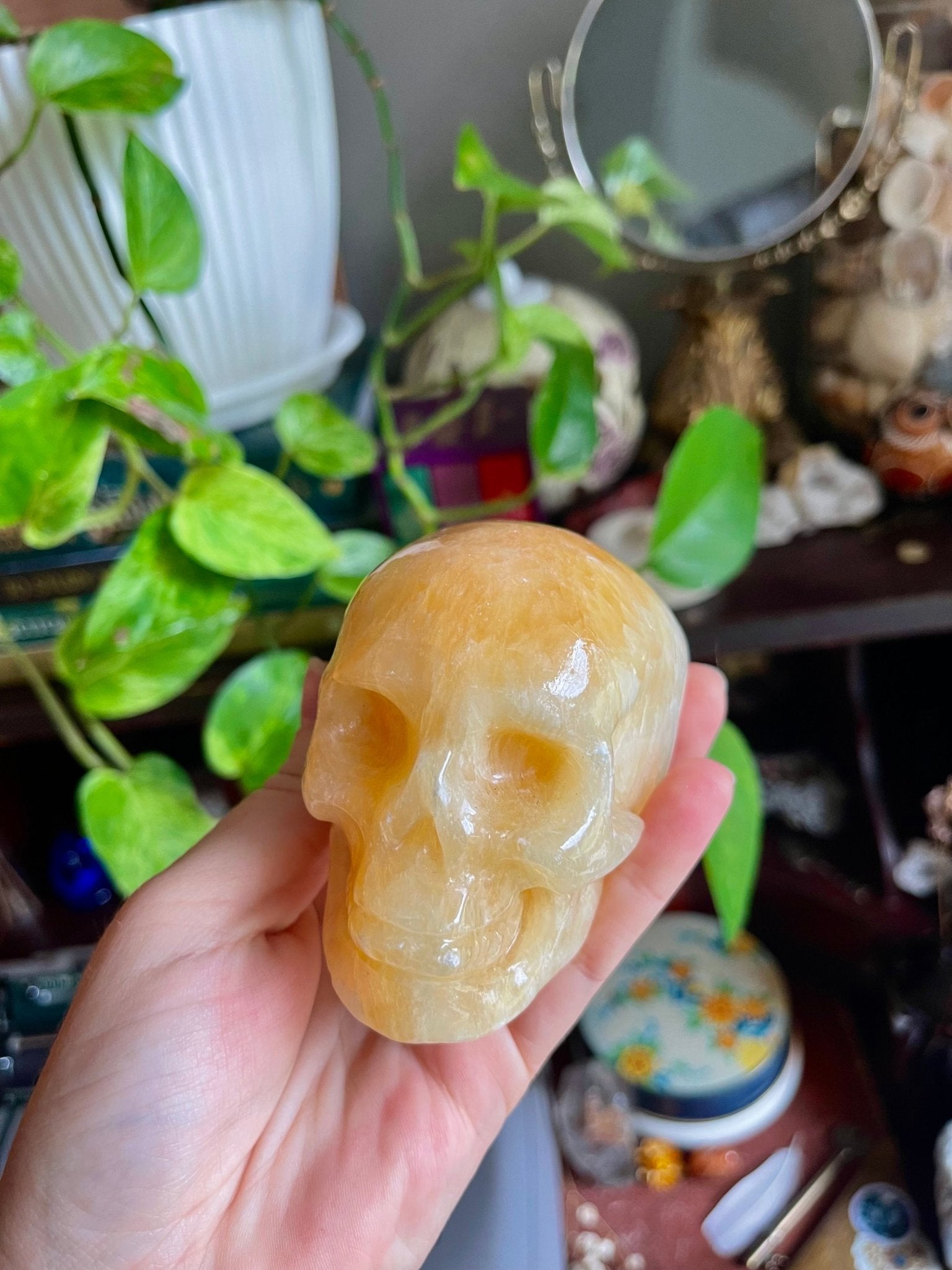 orange calcite skulls - lil shop of light & love