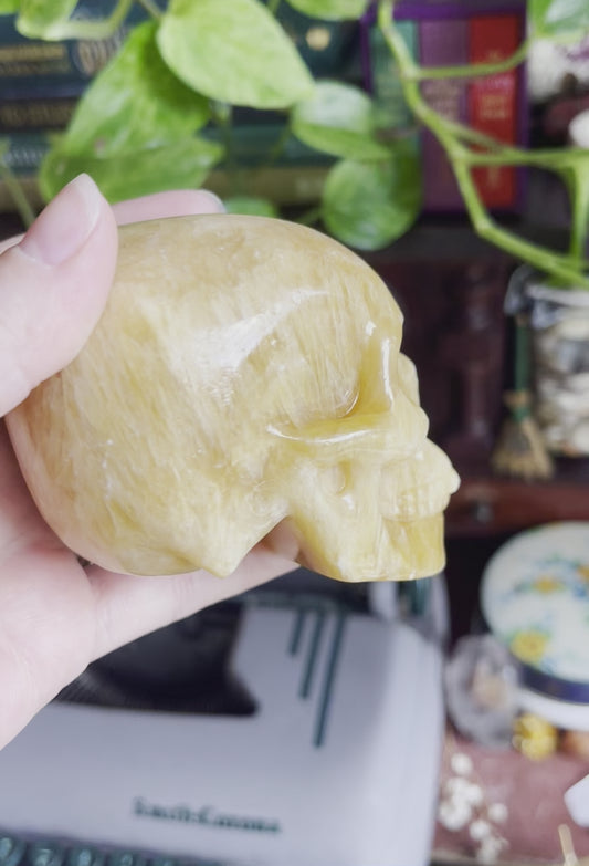 orange calcite skulls