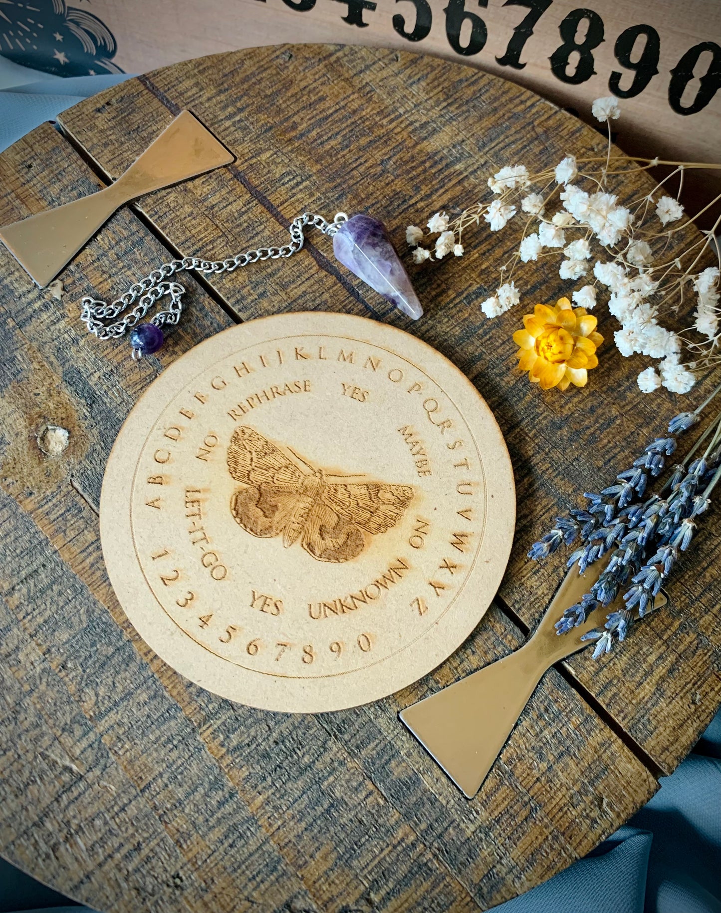 wooden moth spirit board